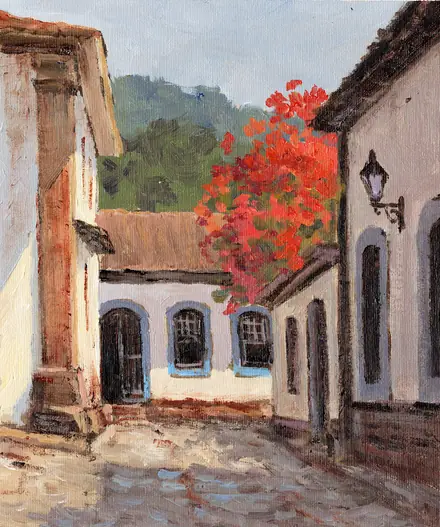 Pintura de Mário Sérgio Freitas: rua de pedra entre casarios coloniais, com uma árvore de flores vermelhas